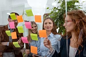 Brainstorming With Notes On The Glass Wall